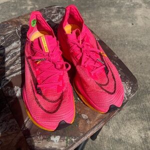 Nike Pink and Yellow Athletic Shoes